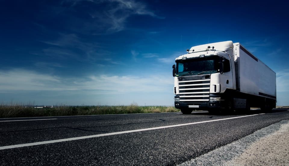 Commercial truck on a road, from the approved company profile